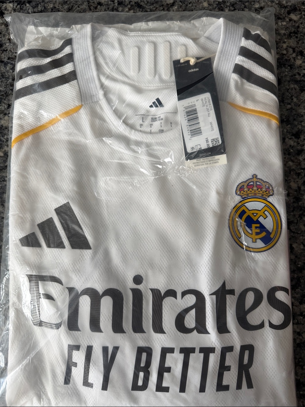 adidas White Real Madrid Jersey with Gold and Gray Accents